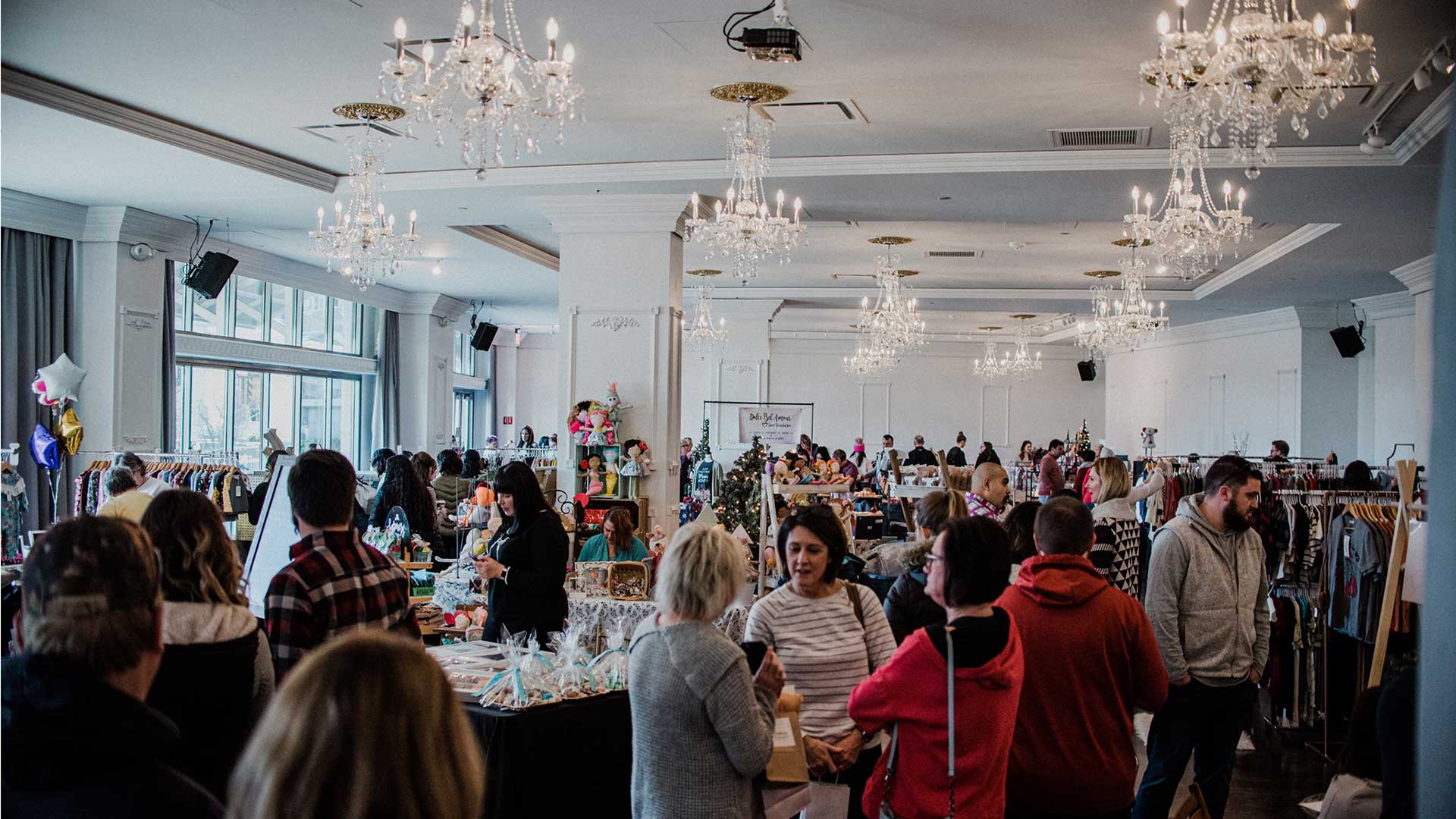 Shoppers at Midtown Merry Market in Empire Room