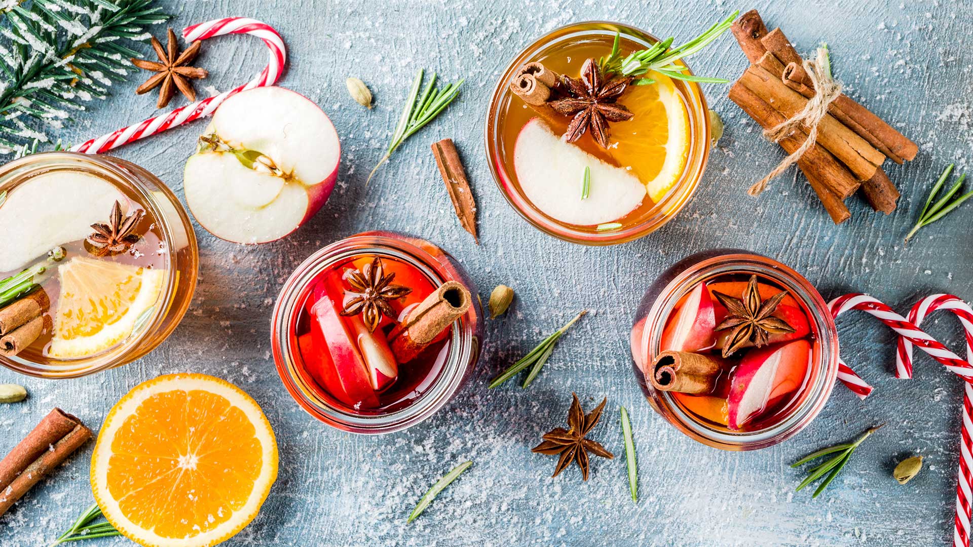 Special holiday-themed cocktails with candy canes and fruit