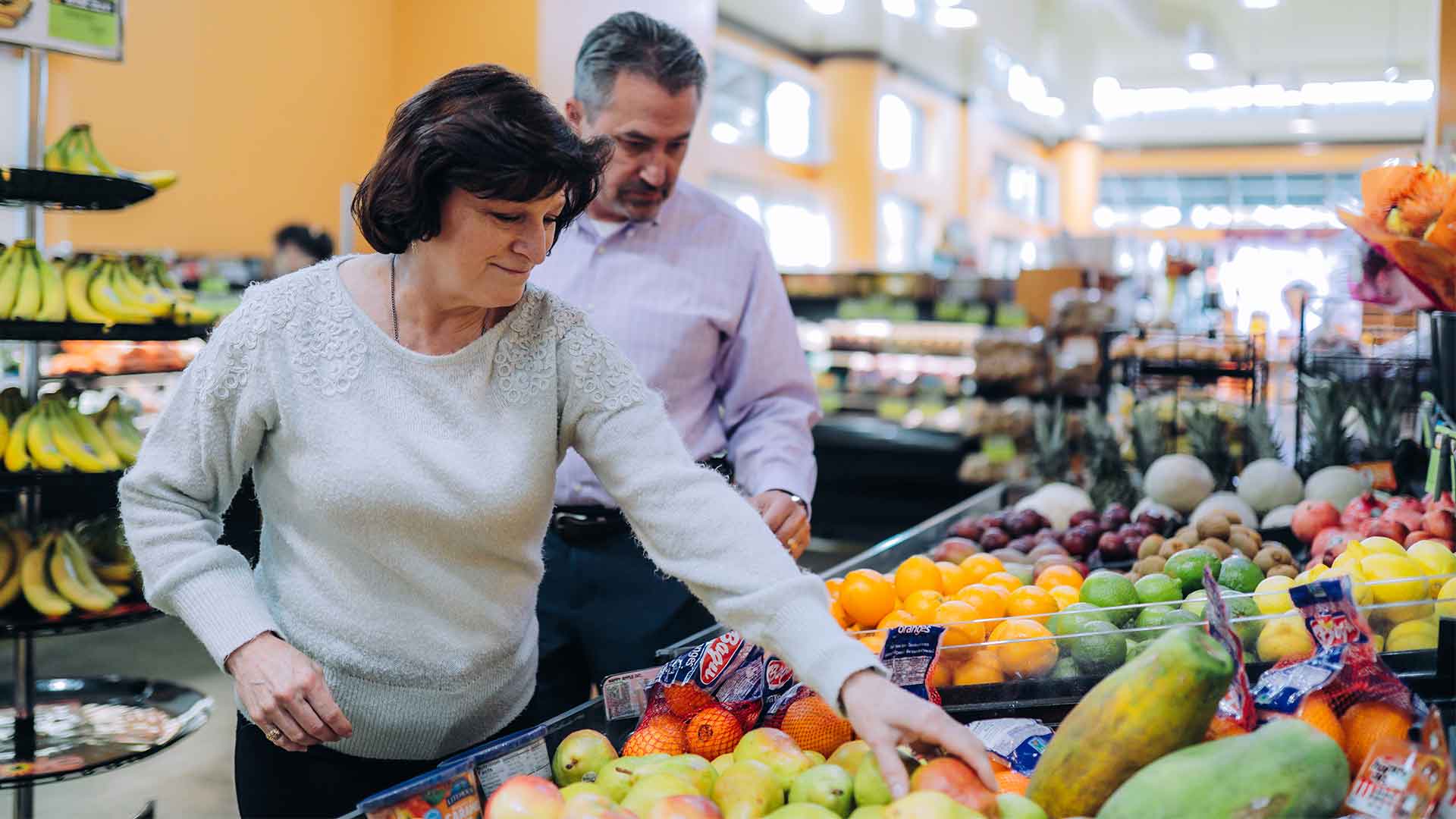 People shopping at Wohlners Grocery in Omaha, NE